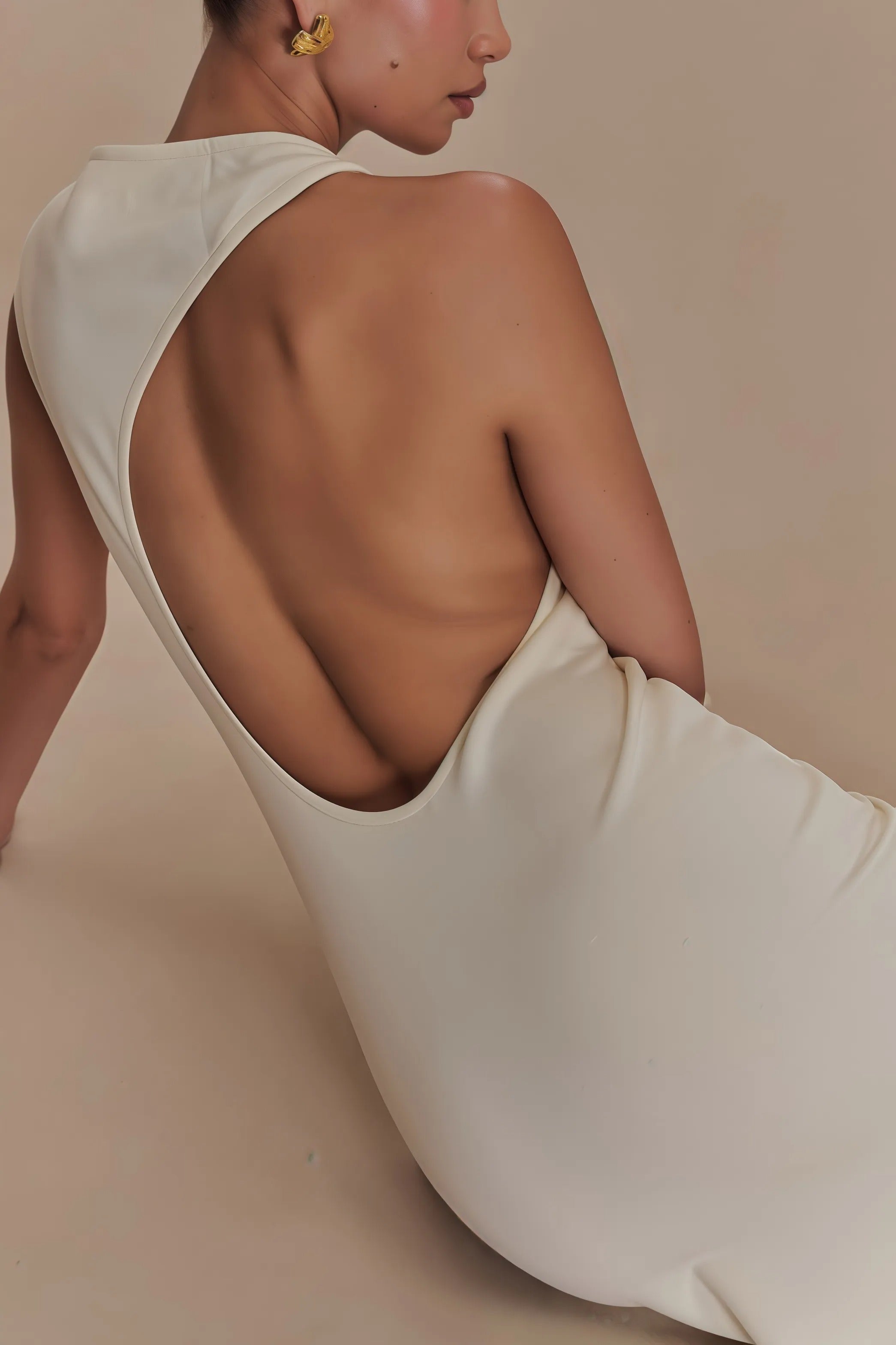 Cream sleeveless maxi dress with high neck