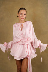 Pink kimono dress with floral details