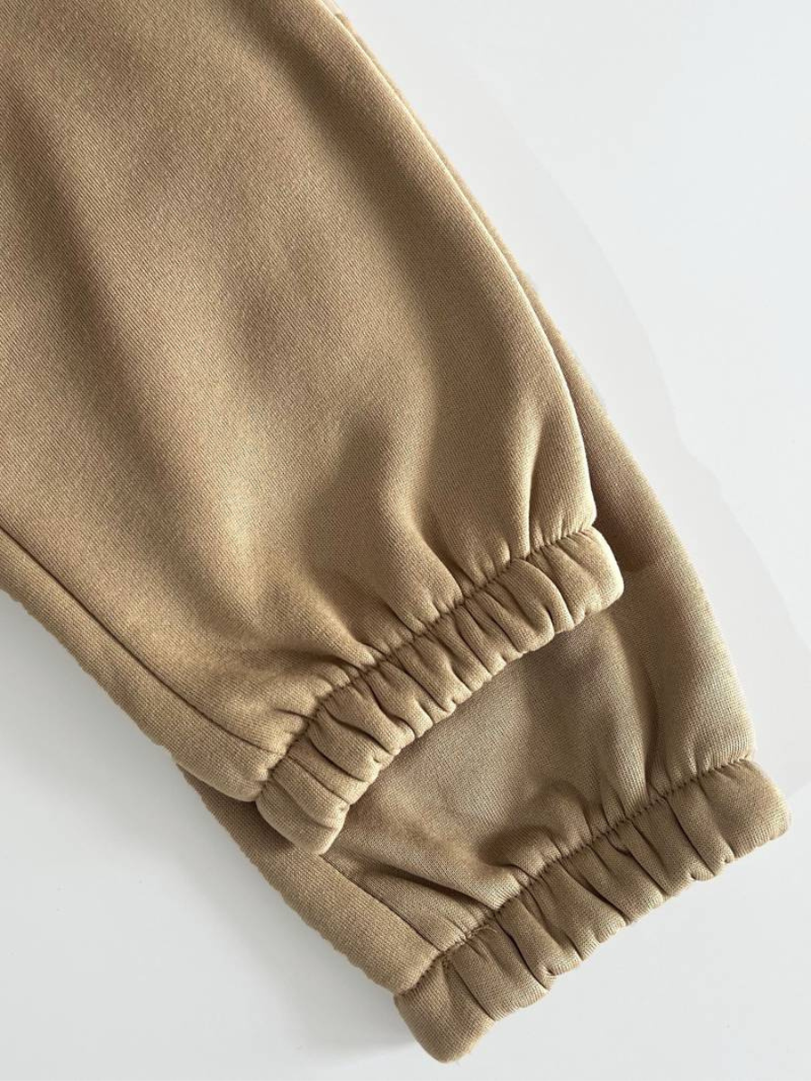 Blus med dragkedja och träningsoverallsbyxa