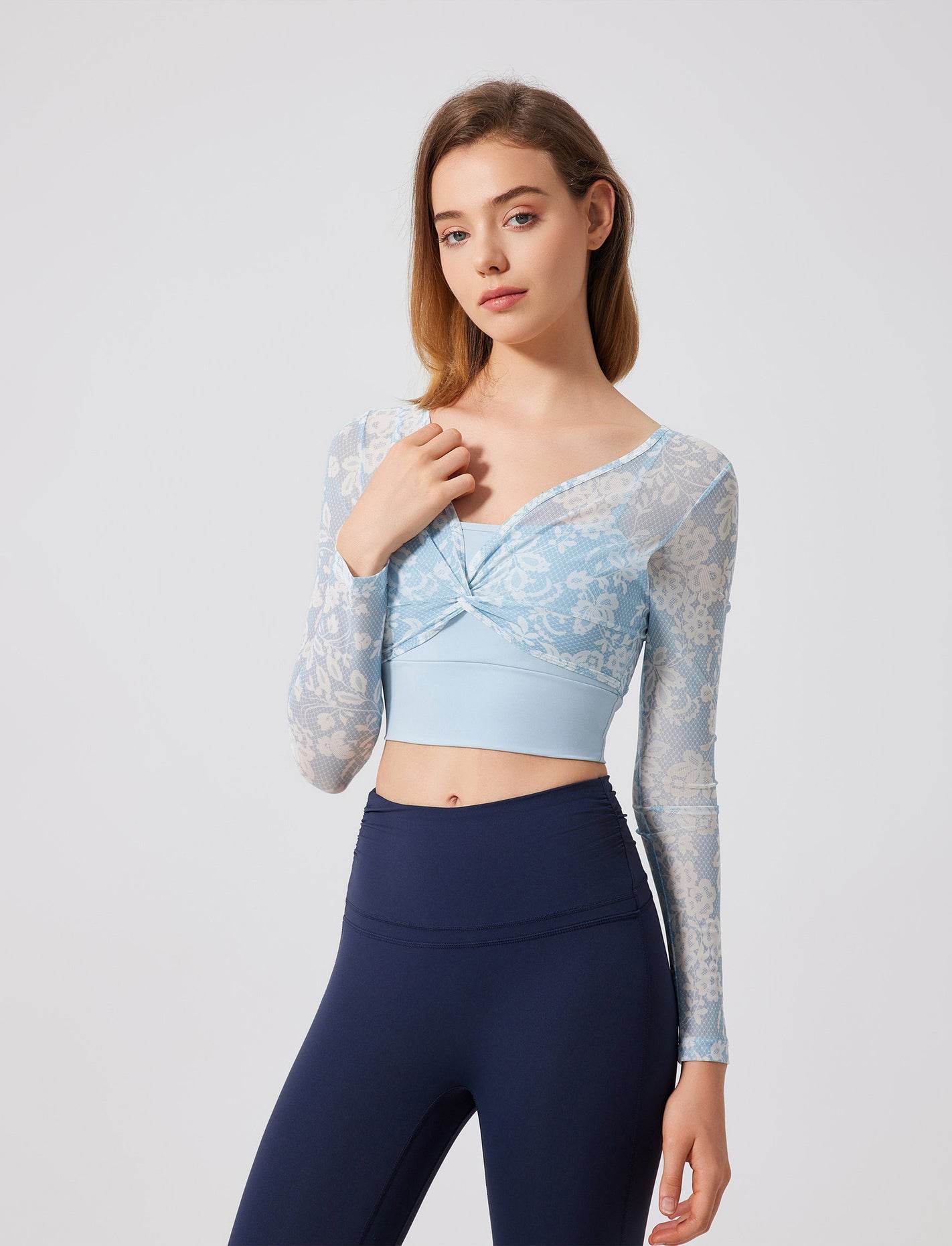 Floral patterned crop top with mesh sleeves