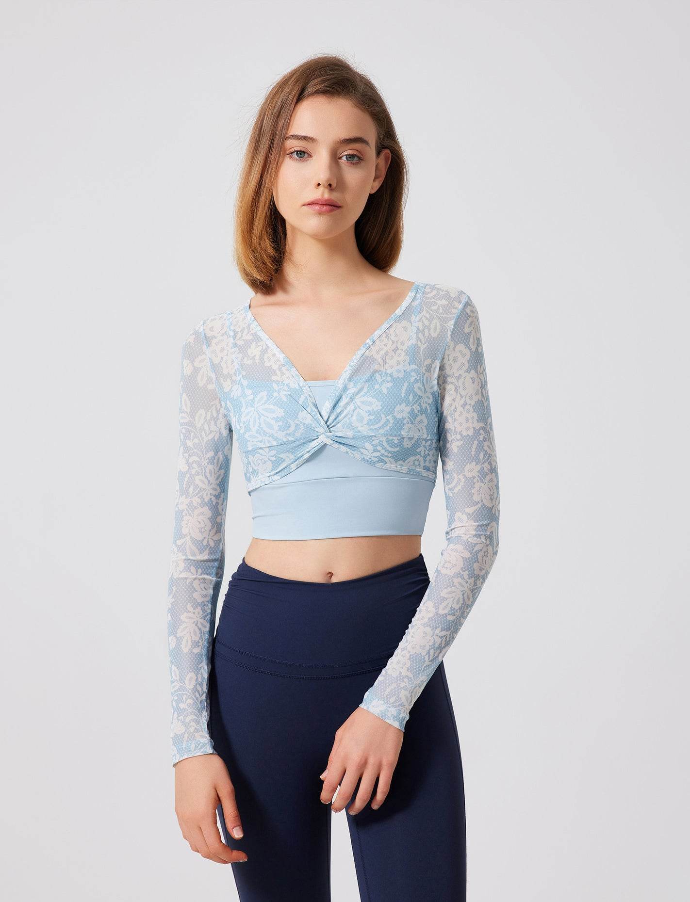 Floral patterned crop top with mesh sleeves