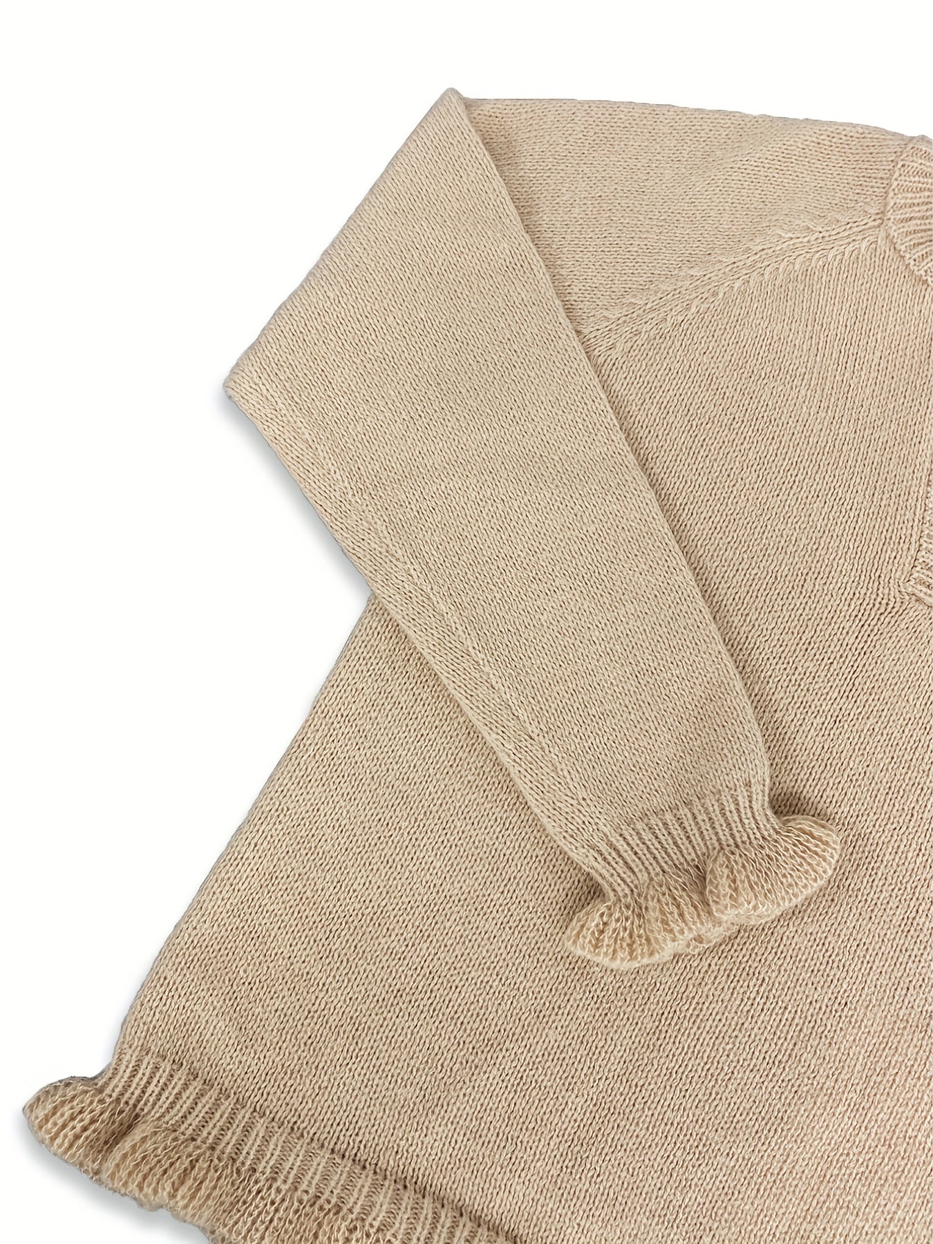 V-ringad tröja med volang i nederkanten