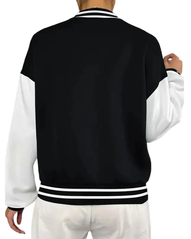 Black and white varsity jacket with letter patch