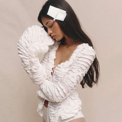 Vit cardigan med utskärning och knytband