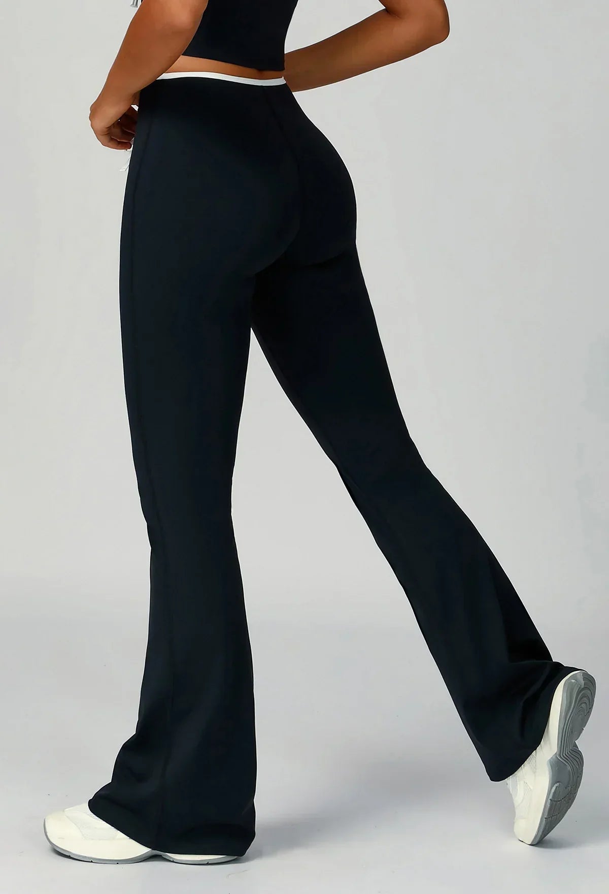 Sporty flared pants with bow detail
