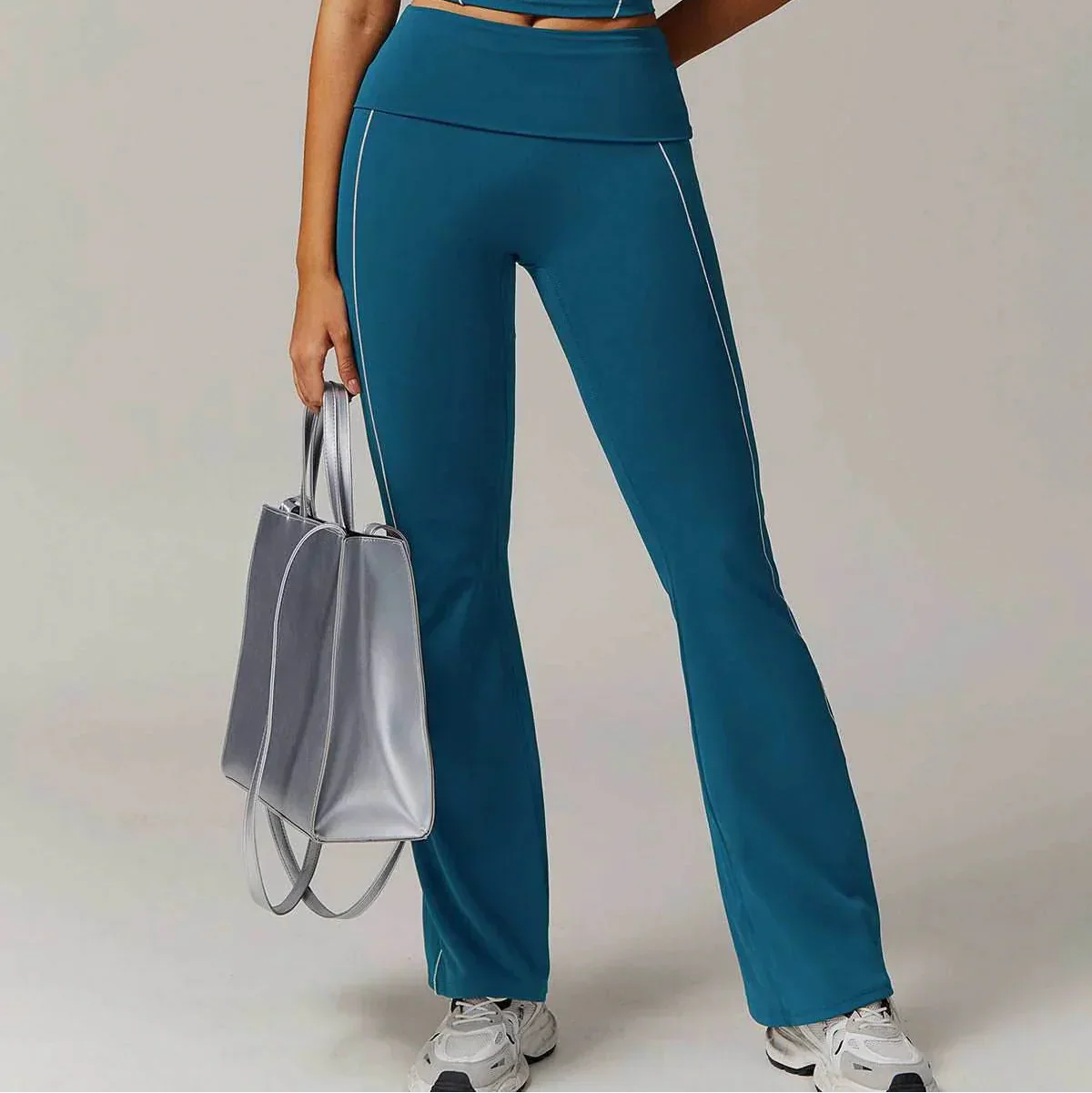 Flared sports pants with contrast stitching