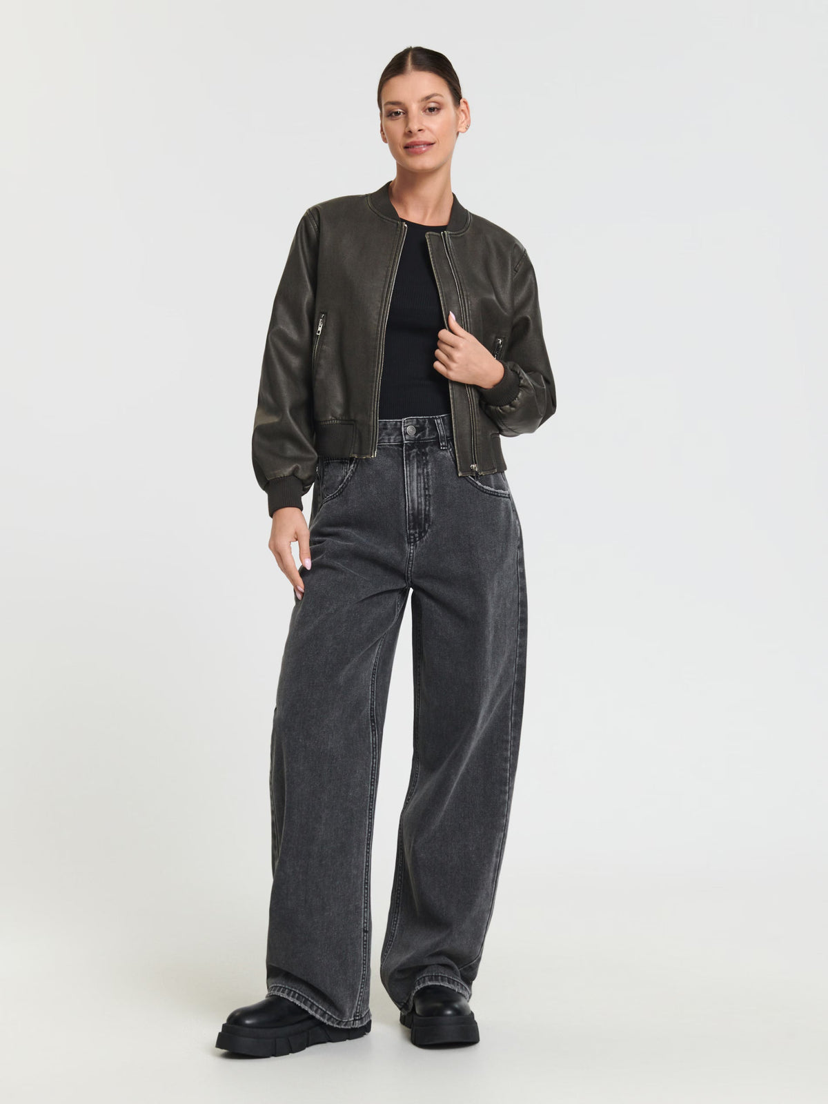 Black bomber jacket with zipper pockets