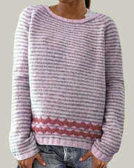 Striped knitted sweater with patterned hem