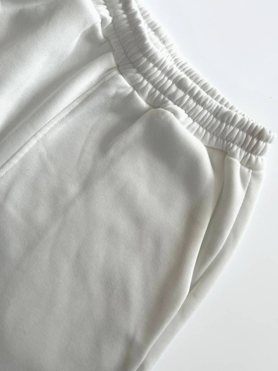 Blus med dragkedja och träningsoverallsbyxa