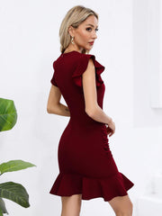 Ruffled dress with defined waist