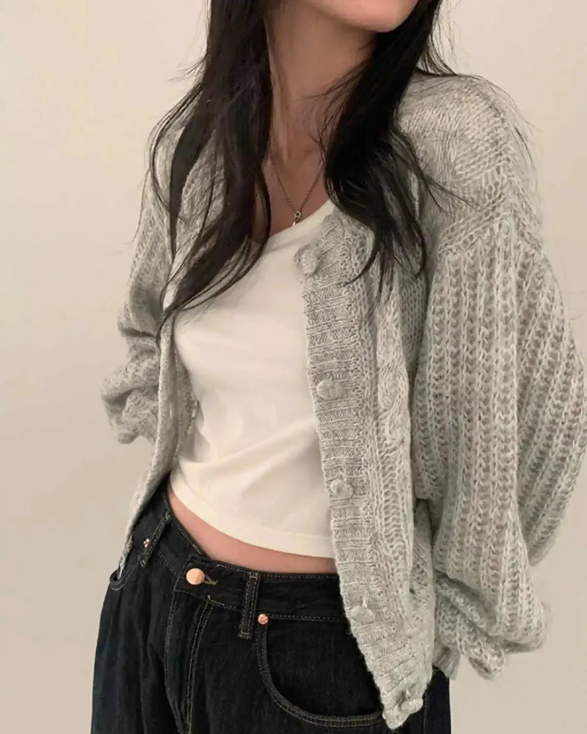Gray knitted cardigan with dropped shoulders