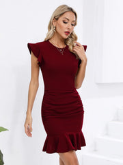 Ruffled dress with defined waist