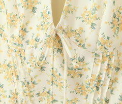 Yellow floral print mini dress with puff sleeves