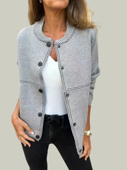 Knitted cardigan with buttons and contrast stitching