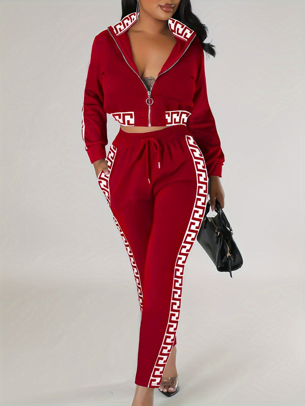 Sportblus och byxor med printdetaljer