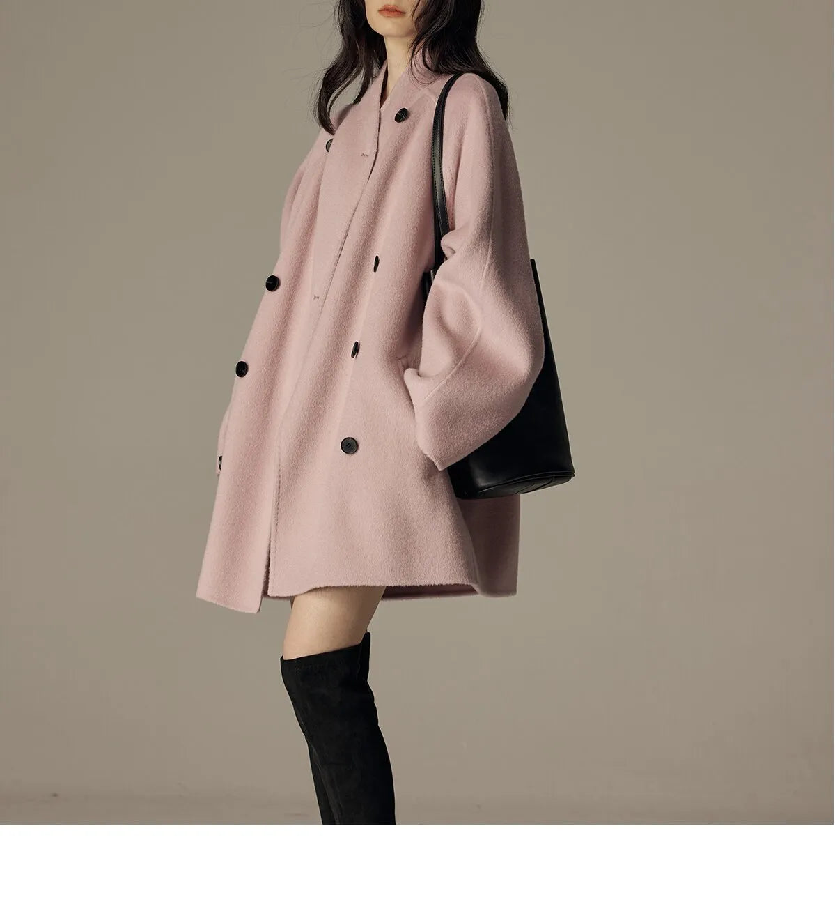 Oversized double-breasted coat with shawl collar.