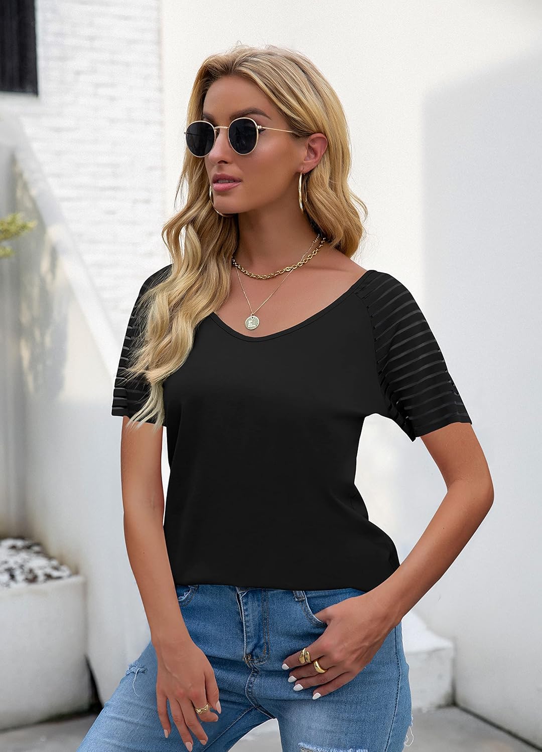 T-shirt with transparent stripes on the sleeves