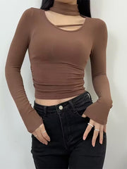 Elegant långärmad topp med halsdetalj