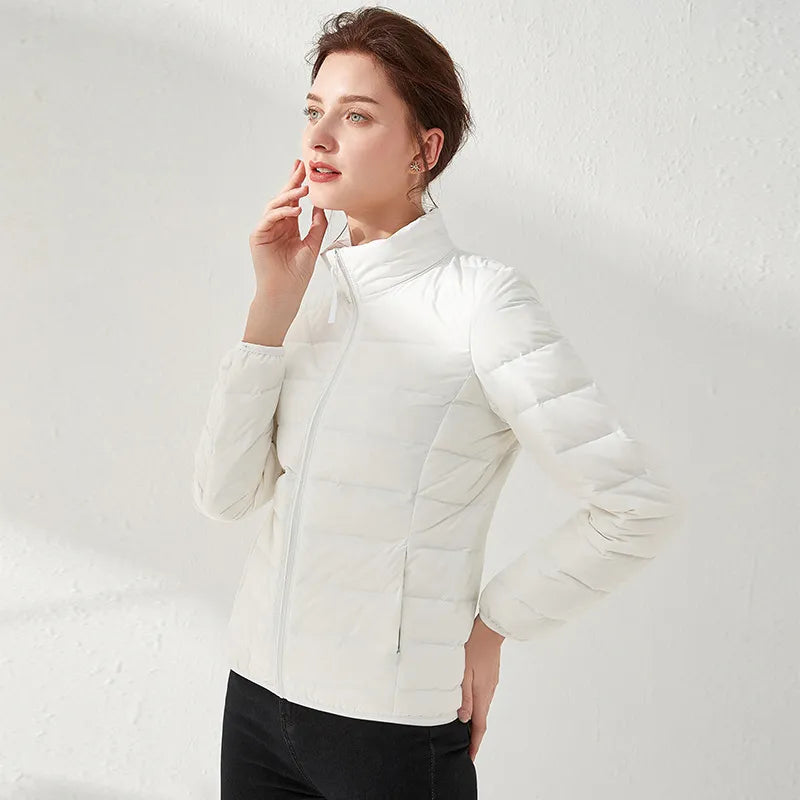Lightweight puffer jacket with high collar and slim fit