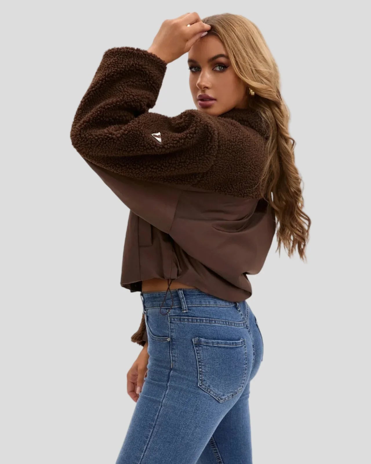 Puffer jacket with high collar and textured sleeves - drawstring at hem