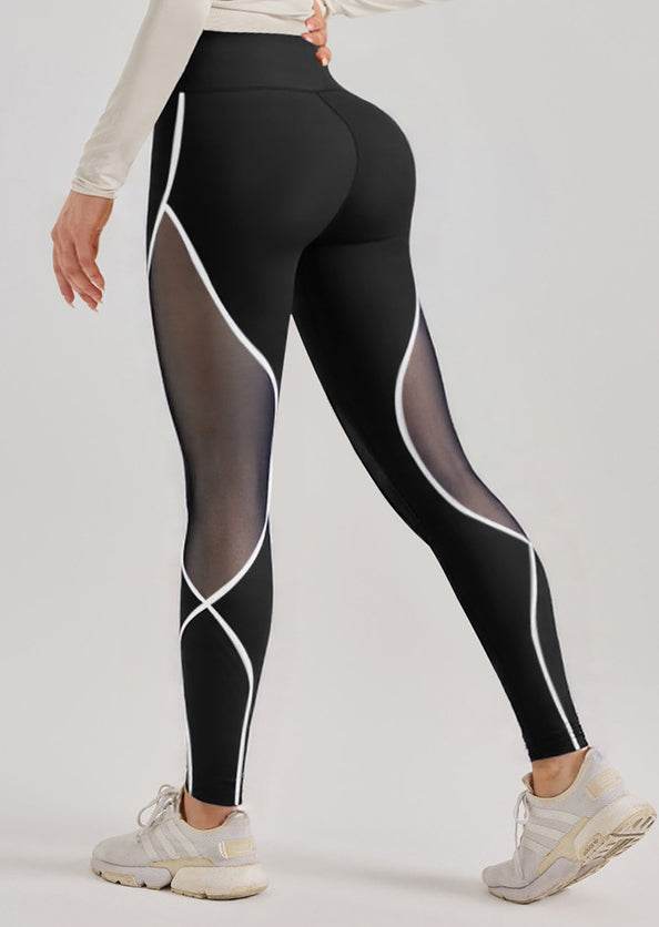 Black leggings with white accents and mesh details