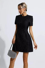 Black textured short sleeve mini dress