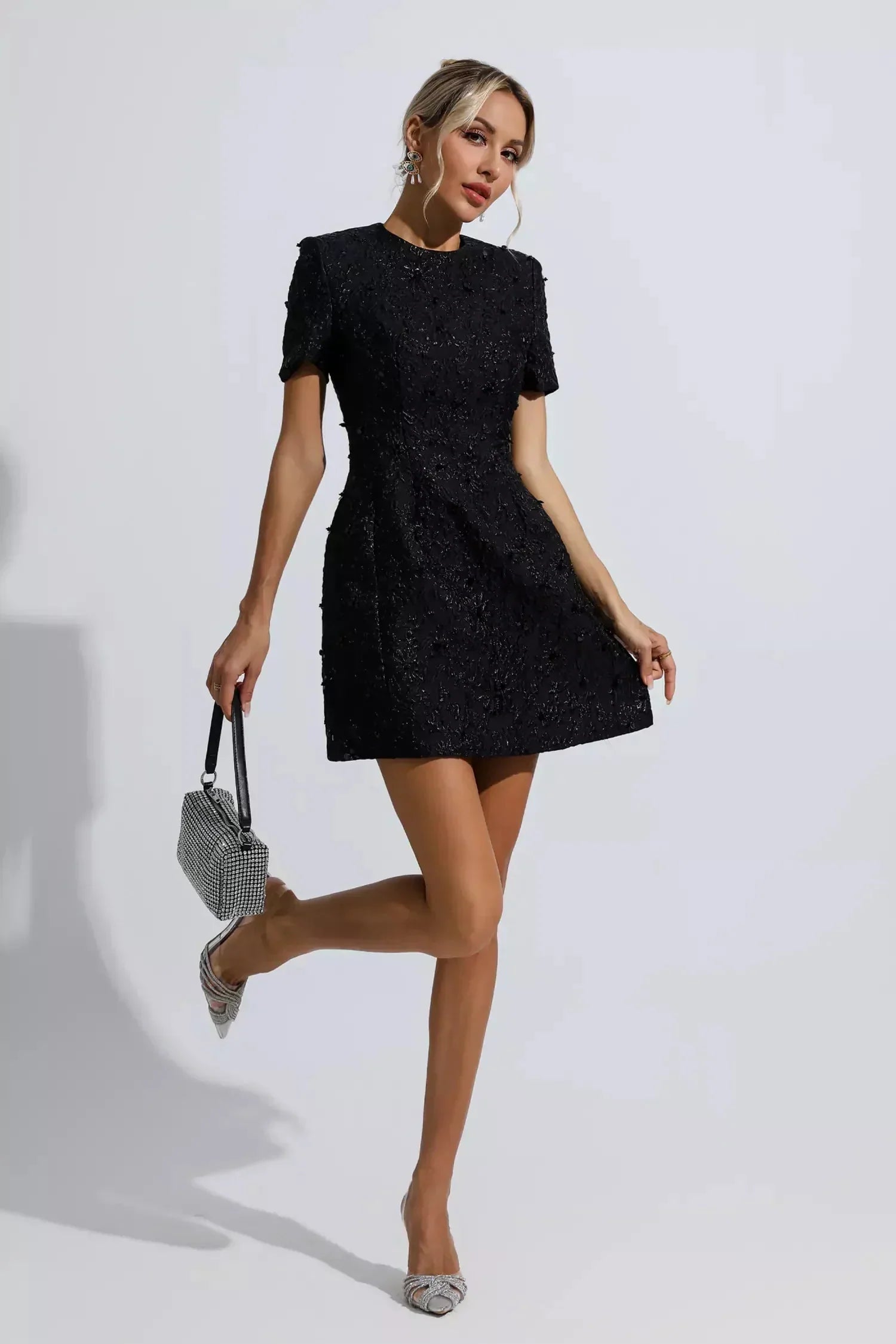 Black textured short sleeve mini dress