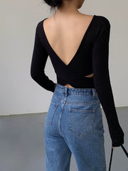 Fitted top with long sleeves and round neck