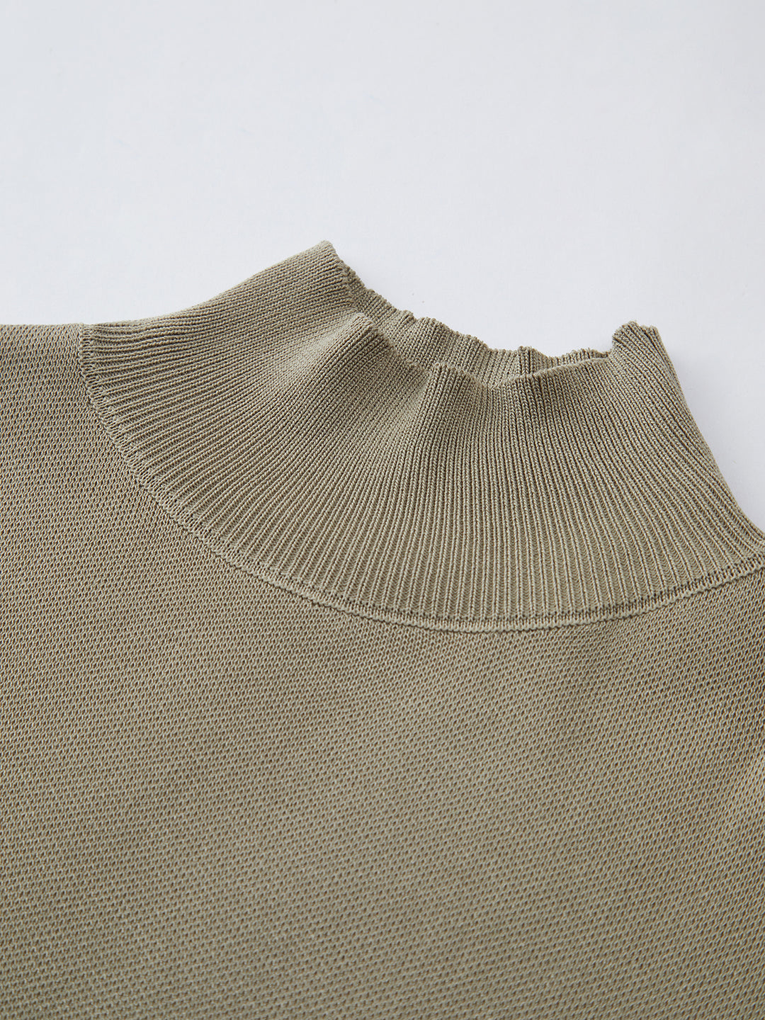 Short-sleeved knitted top with high neck