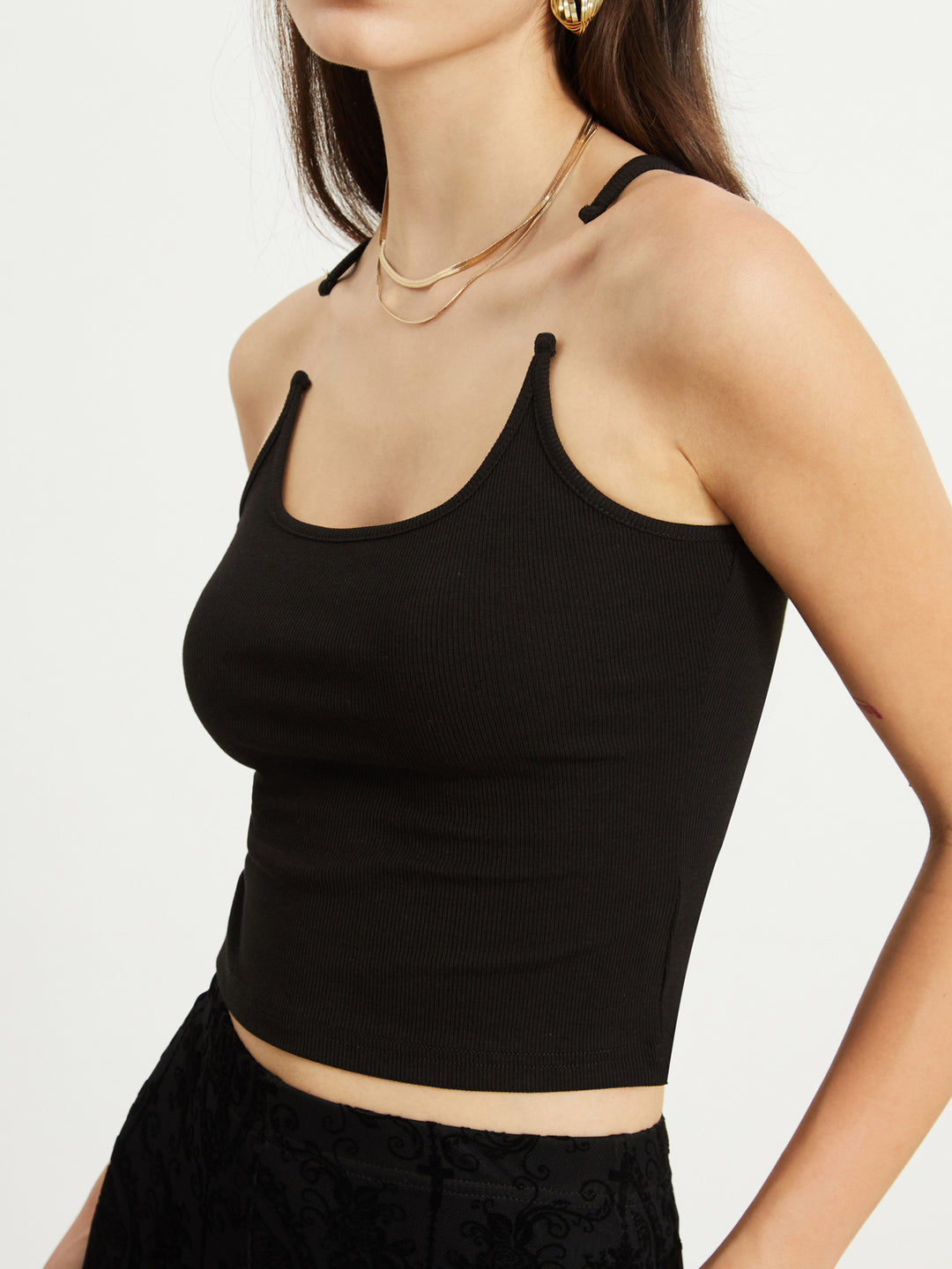 Ribbed tank top with button details on the shoulders