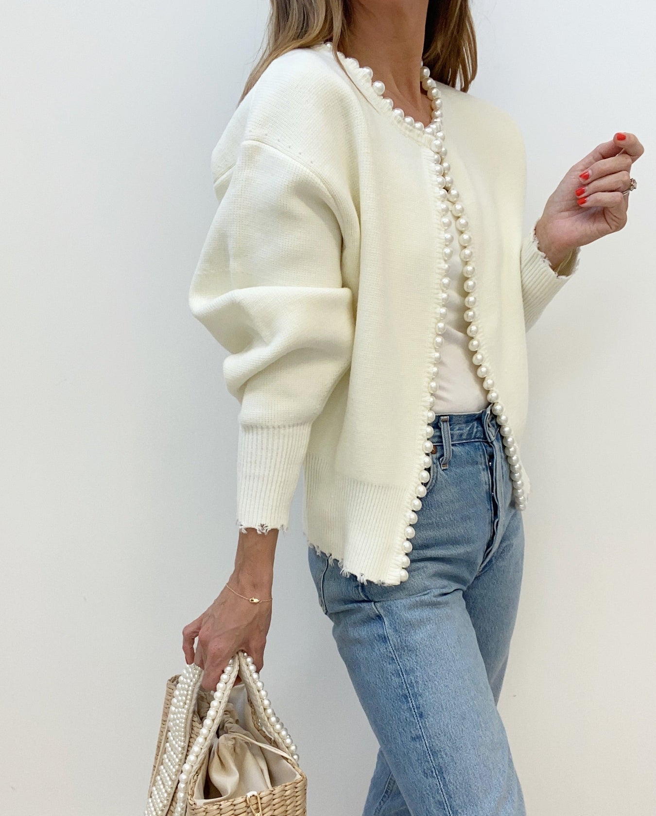 Elegant kofta med pärlor