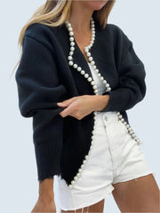 Elegant kofta med pärlor