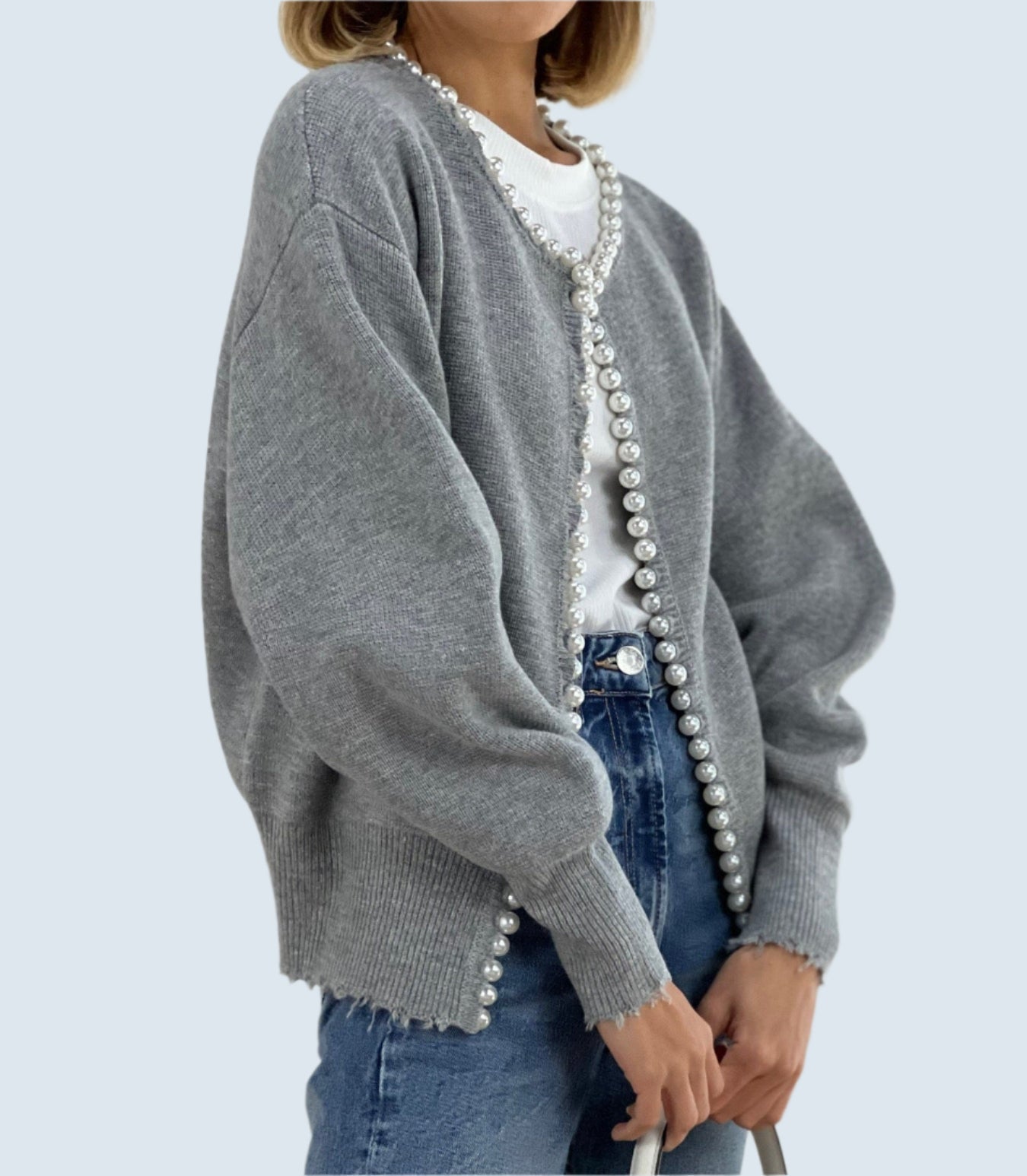 Elegant kofta med pärlor