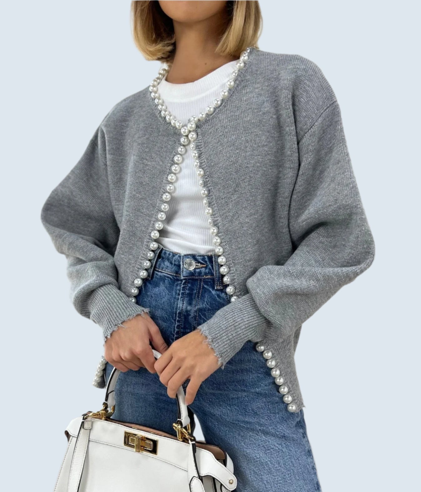 Elegant kofta med pärlor