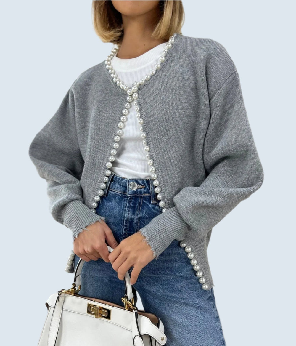 Elegant kofta med pärlor