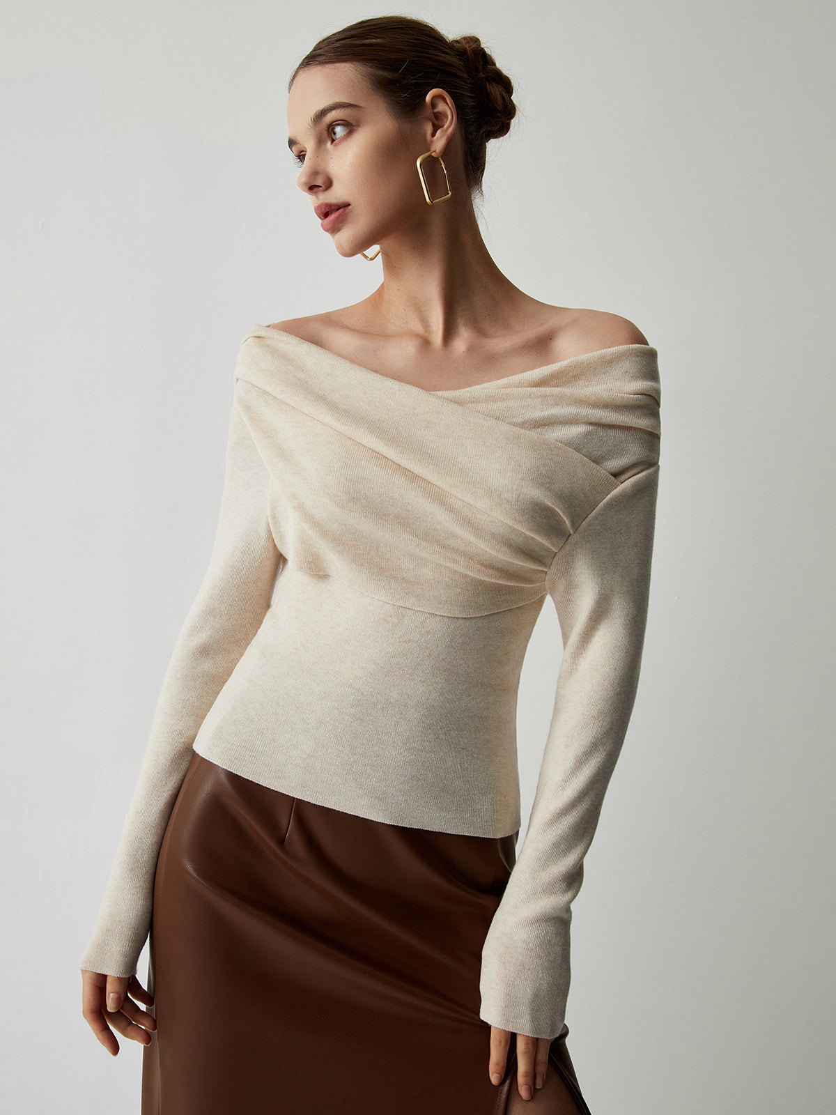 Off-the-shoulder draped top with long sleeves
