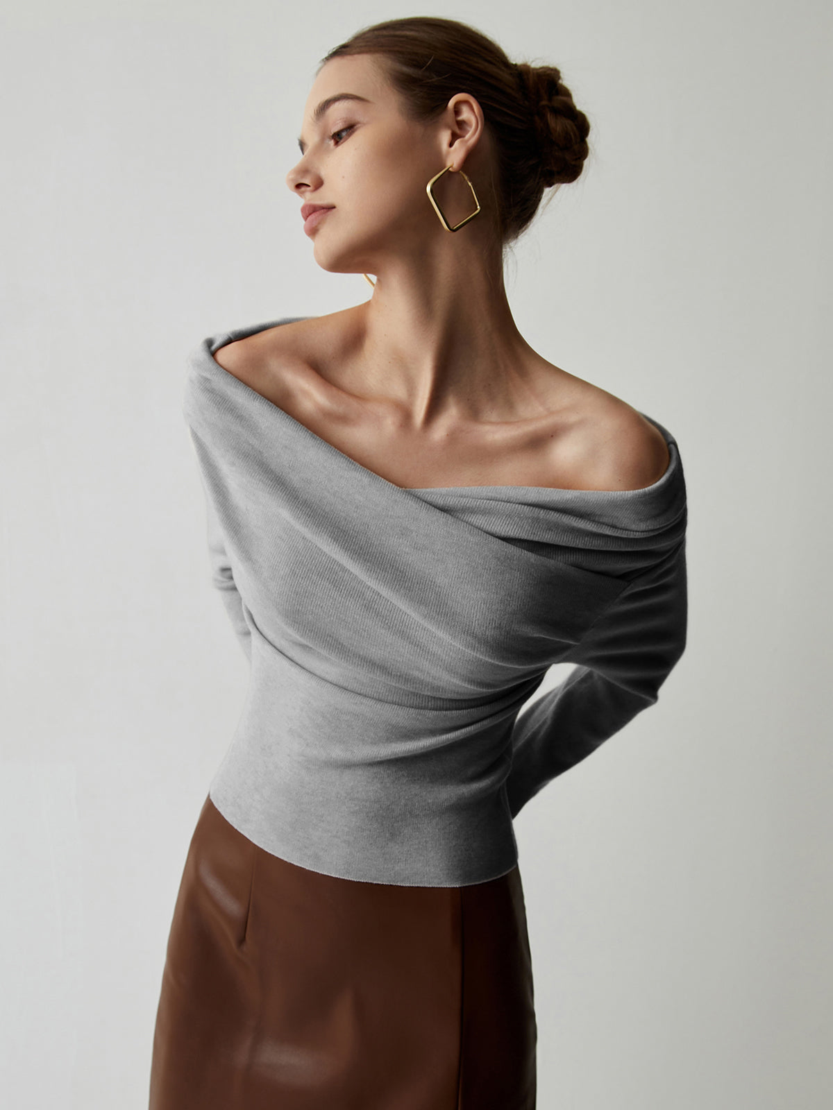 Off-the-shoulder draped top with long sleeves