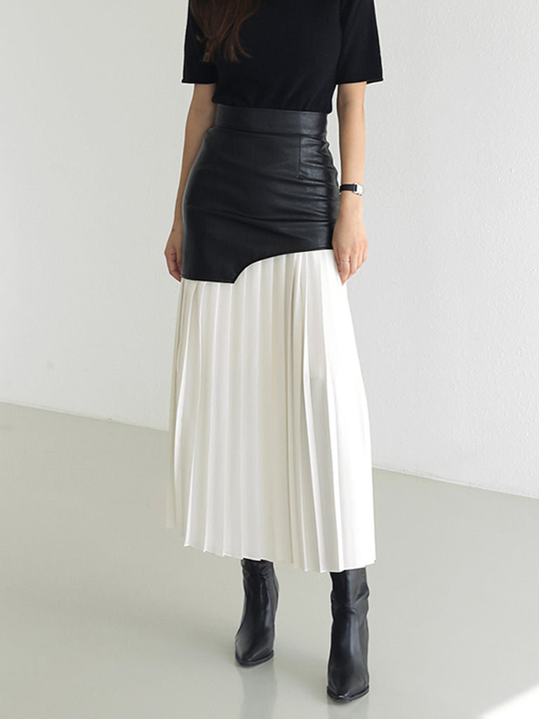 Pleated midi skirt with asymmetrical faux leather yoke