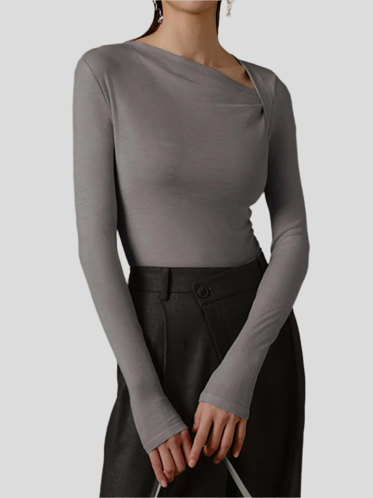 Seamless top with long sleeves and asymmetrical neckline