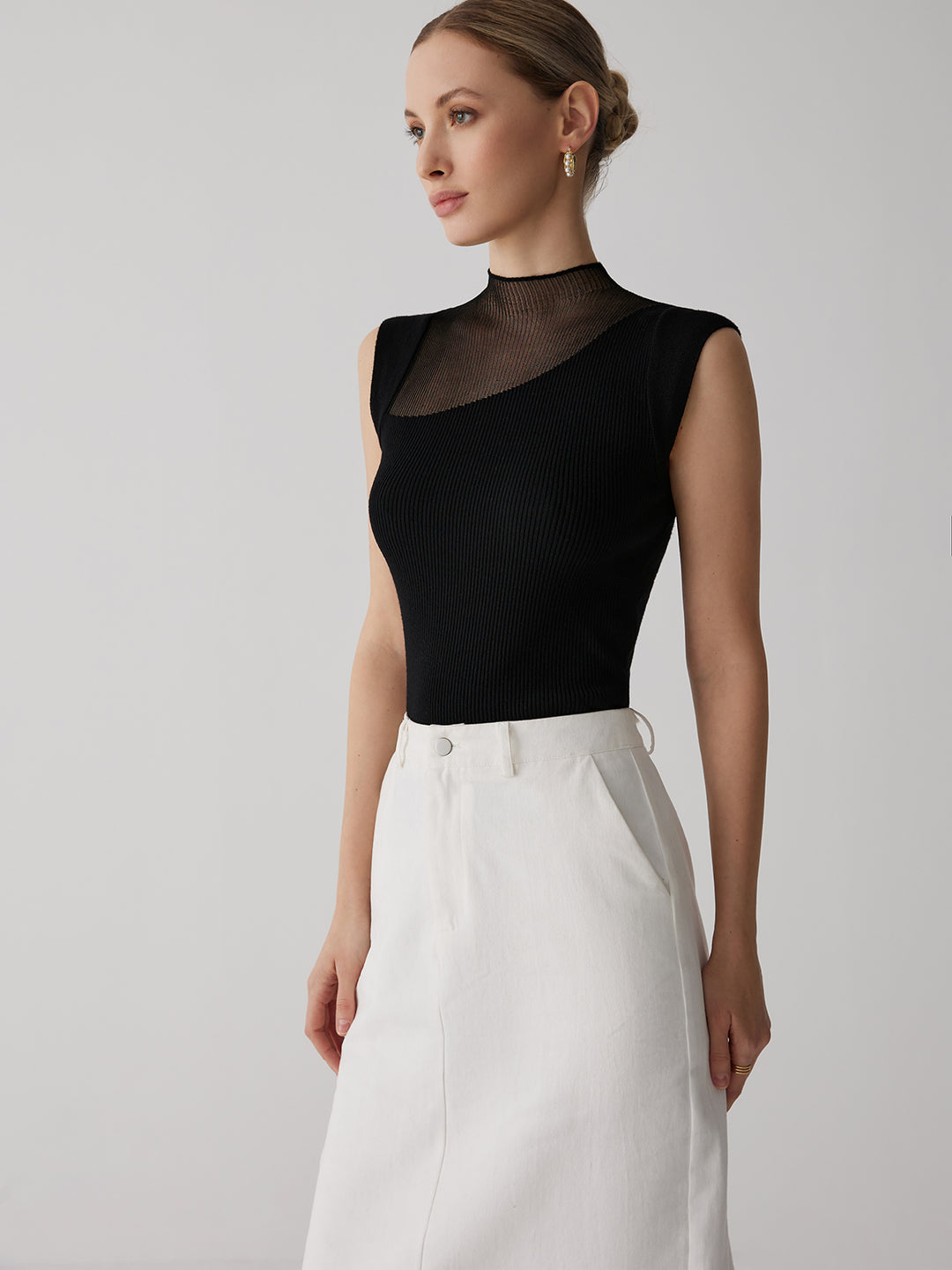 Sleeveless ribbed top with fishnet details