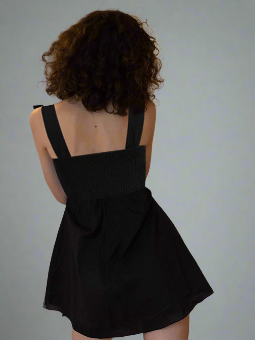 Black mini dress with bow