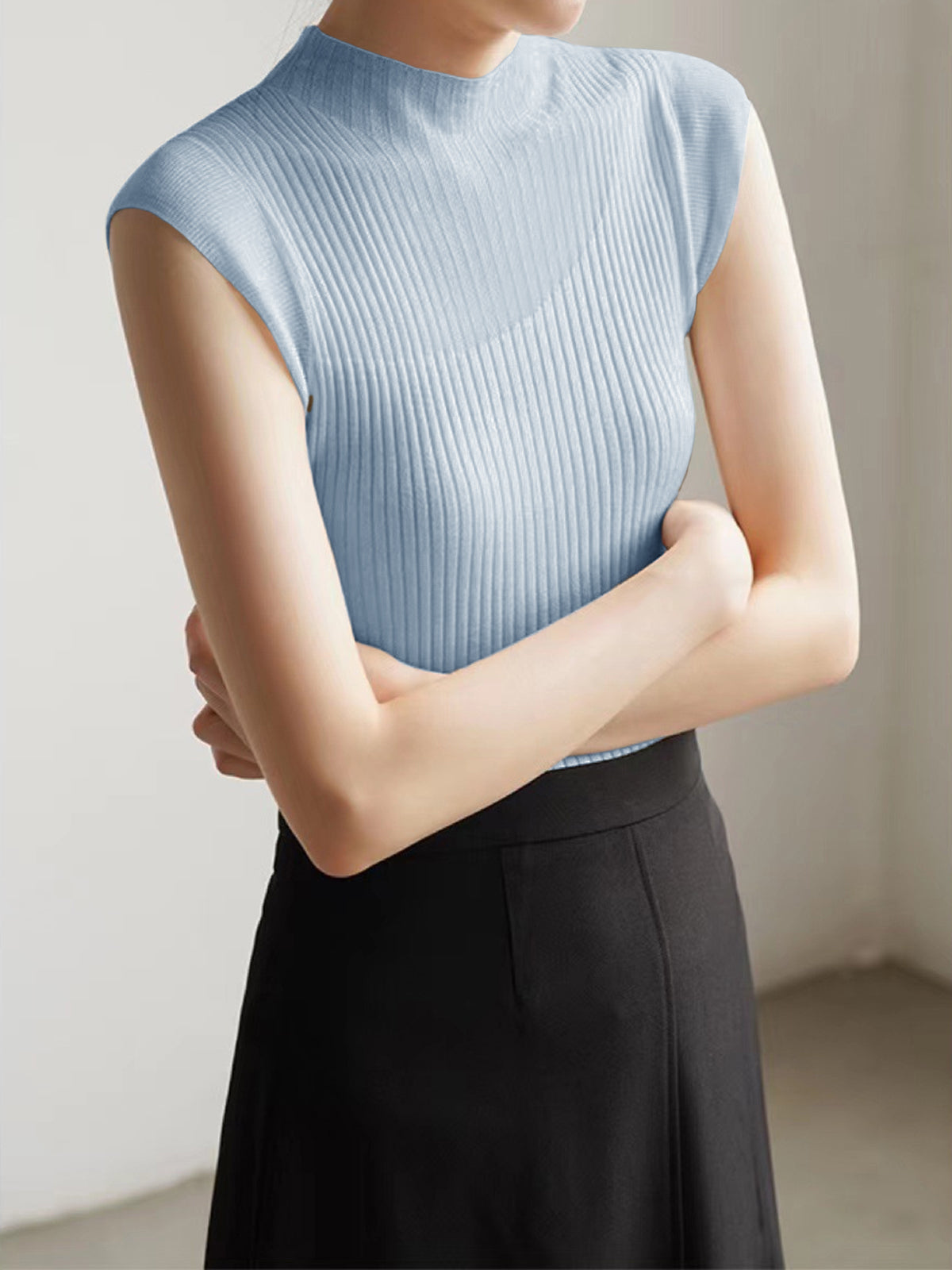 Sleeveless ribbed top with fishnet details