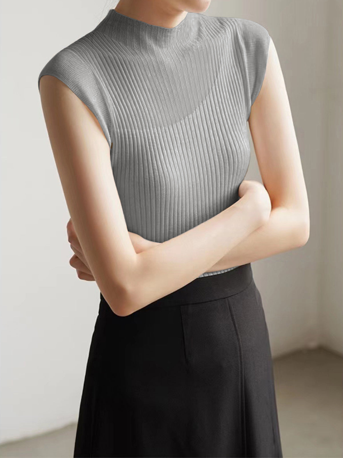 Sleeveless ribbed top with fishnet details
