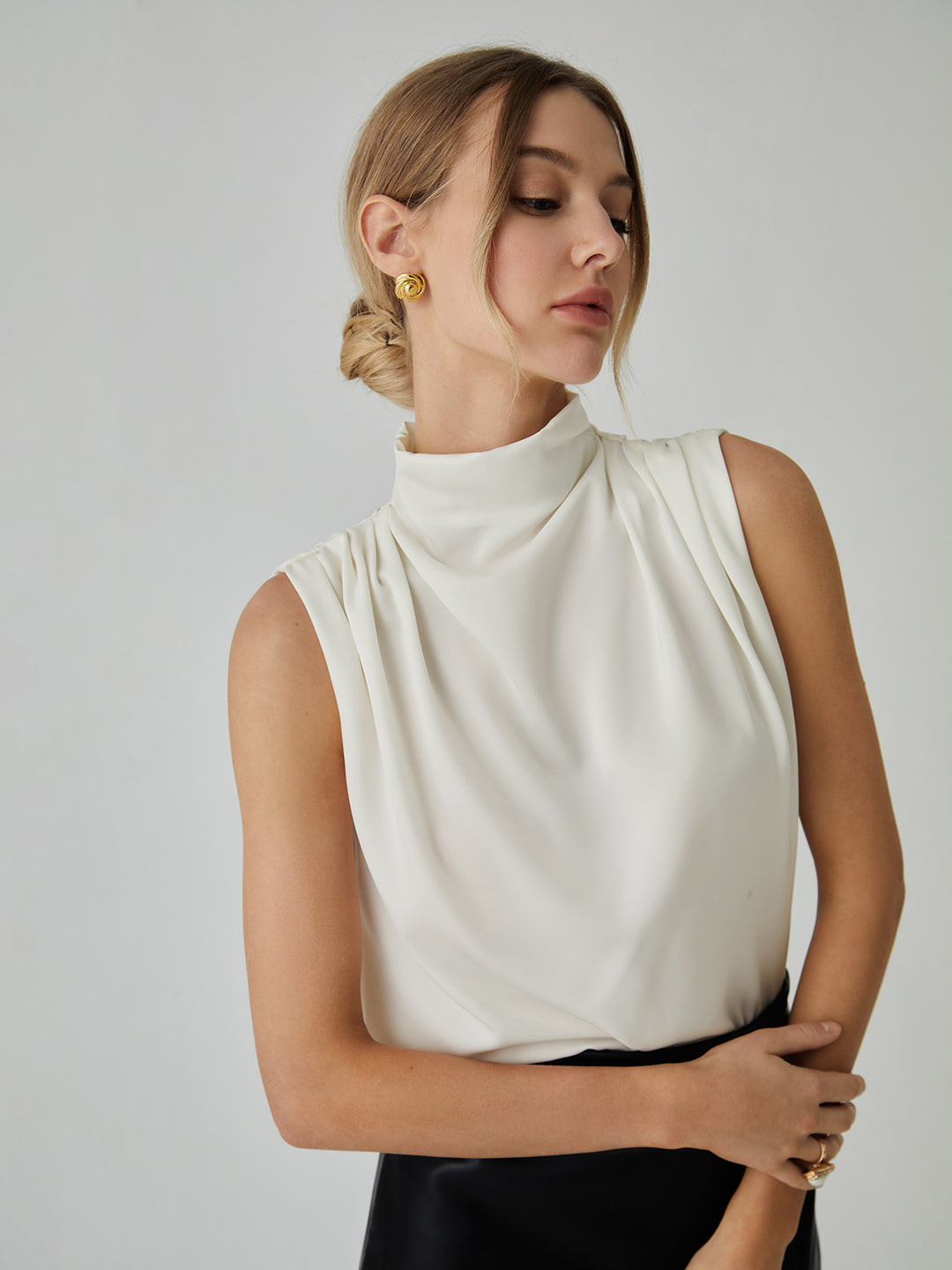 Sleeveless high neck blouse