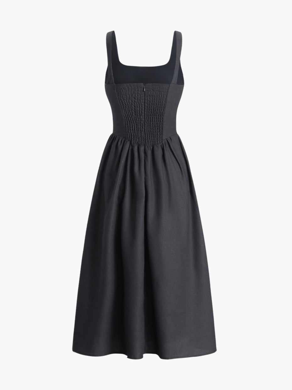 Black dress with fitted waist and bow detail
