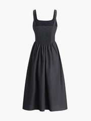 Black dress with fitted waist and bow detail