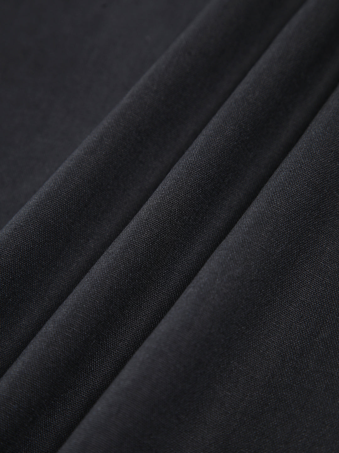 Black dress with fitted waist and bow detail