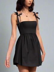 Black mini dress with bow