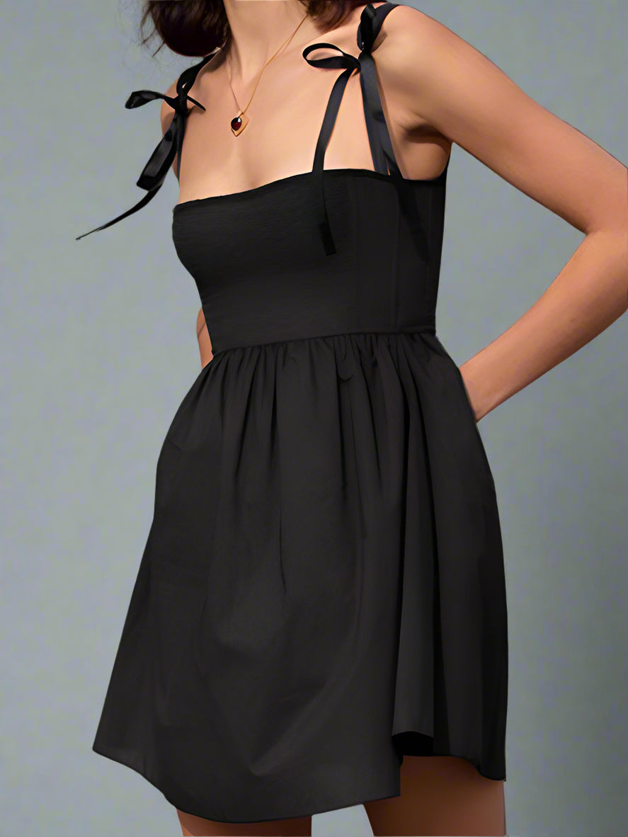 Black mini dress with bow