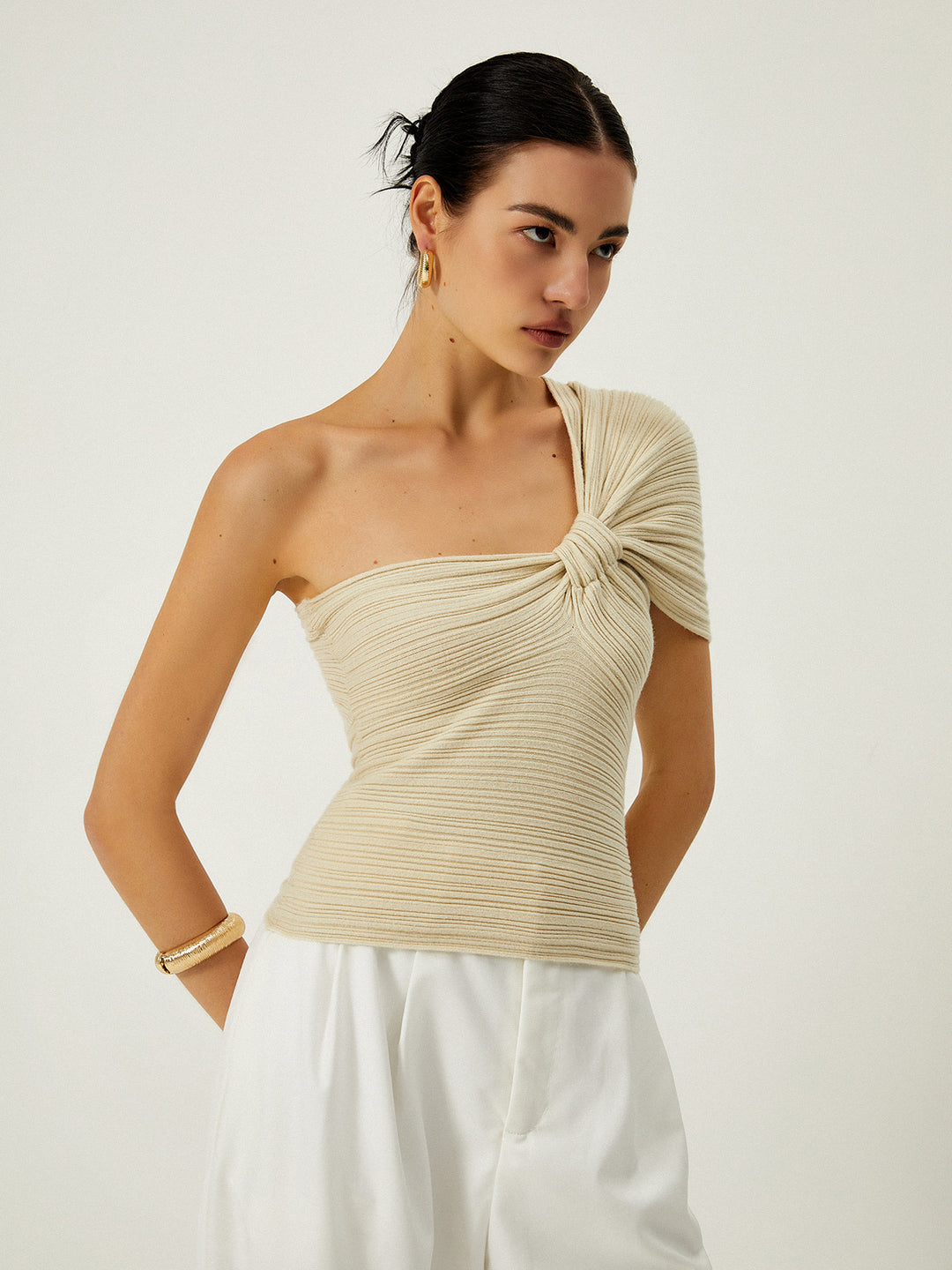 Asymmetrical ribbed top with button detail